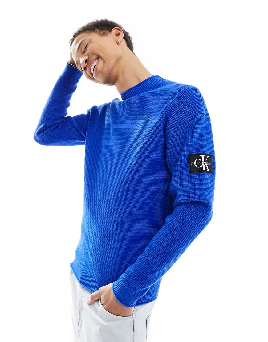 Calvin Klein Jeans relaxed badge logo sweater in blue