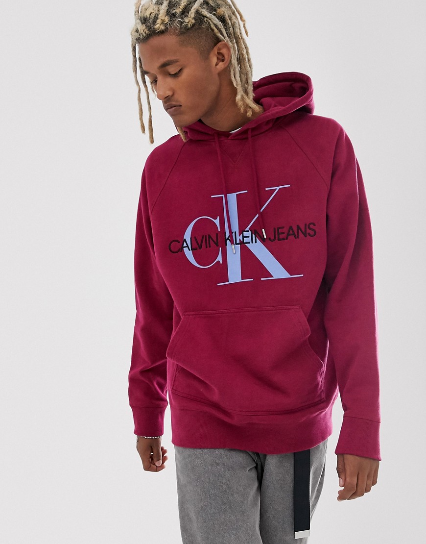 Calvin Klein Jeans relaxed fit hoodie in dark red with monogram chest logo