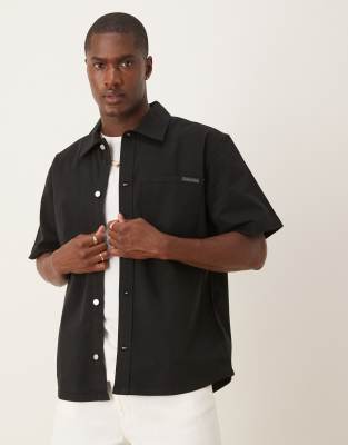 Calvin Klein Jeans Est.1978 Relaxed Utility Short Sleeve Shirt In Black
