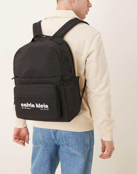 Calvin Klein Jeans retro logo backpack in black - view 1