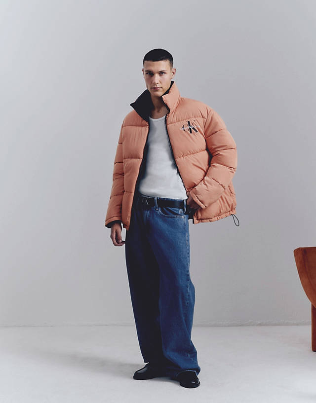 Calvin Klein Jeans - reversible 90s puffer jacket in orange