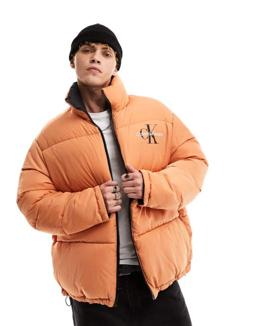 Calvin Klein Jeans reversible 90s puffer jacket in orange