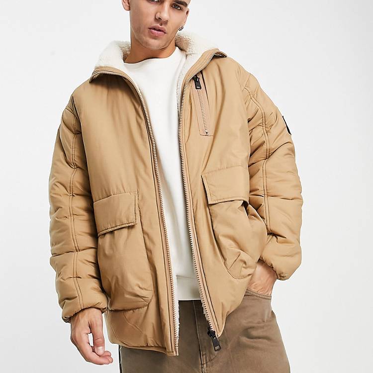 Calvin Klein Jeans reversible sherpa borg long parka jacket in off  white/camel | ASOS