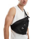 [Calvin Klein Jeans] Calvin Klein Jeans rounded sling bag in black One Size Black