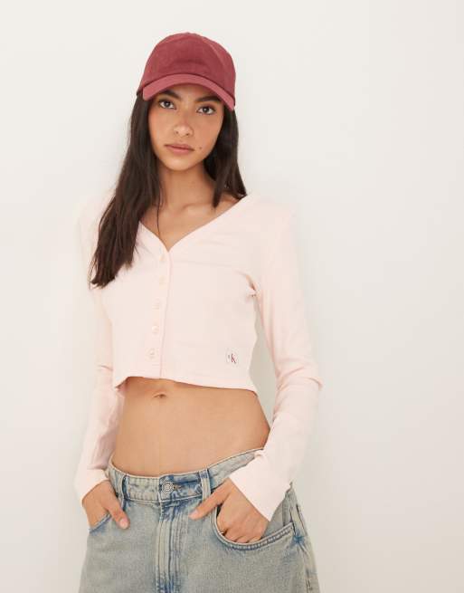 Calvin Klein Jeans – Różowy zapinany na guziki krótki top z długimi rękawami i logo