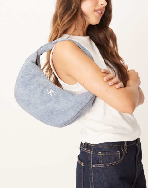 Calvin Klein Jeans - Sac porté épaule incurvé en denim - Bleu clair délavé - view 1
