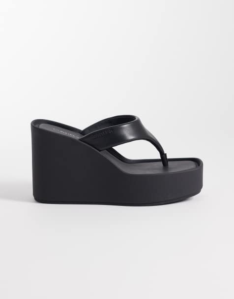 Calvin Klein Jeans - Sandali infradito in pelle neri con zeppa - view 1