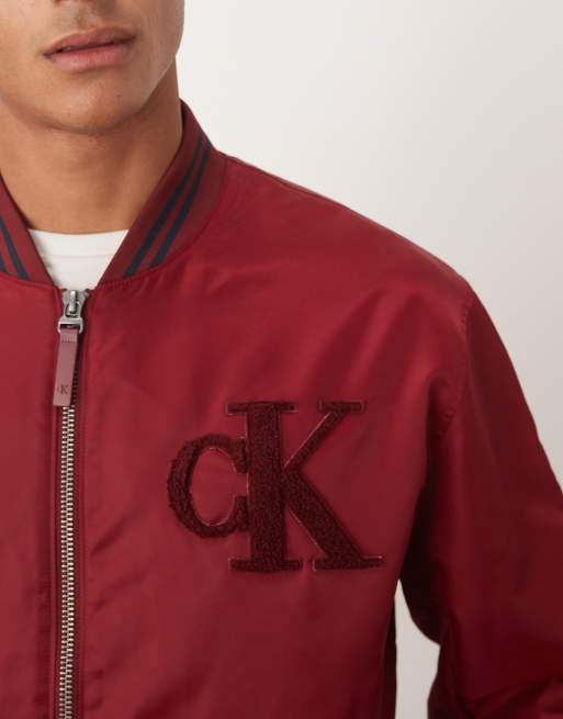 Calvin Klein Jeans satin bomber jacket in burgundy ASOS