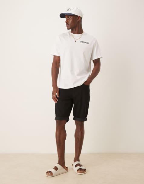 Calvin Klein Jeans – Schmale Jeansshorts in Schwarz mit Umschlagsaum - view 1