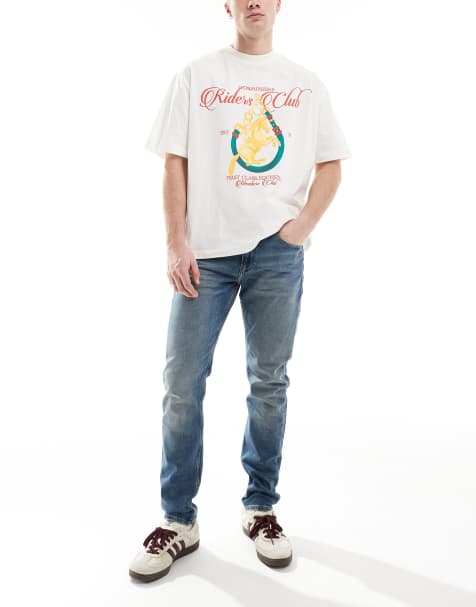 Calvin Klein Jeans – Schmale Karottenjeans in mittlerer Waschung - view 1
