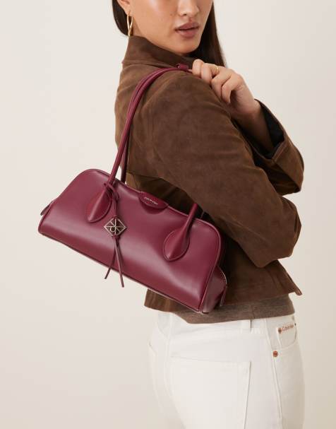 Calvin Klein Jeans – Schultertasche in Rosa mit mehreren Fächern - view 1