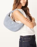 [Calvin Klein Jeans] Calvin Klein Jeans scoop denim shoulder bag in light wash-Blue One Size Denim