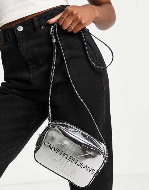 Calvin Klein Jeans sculpted camera bag in silver