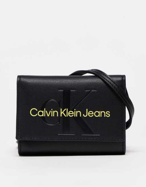 Calvin Klein Jeans sculpted crossbody wallet bag in black ASOS