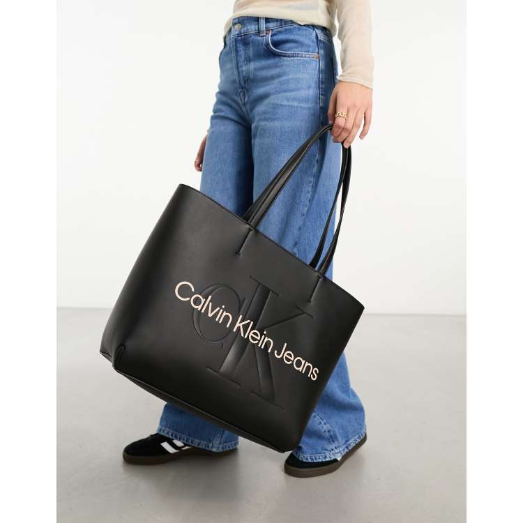 Calvin Klein Jeans Faux Leather Sculpted Monogram Slim Tote Bag • Price »