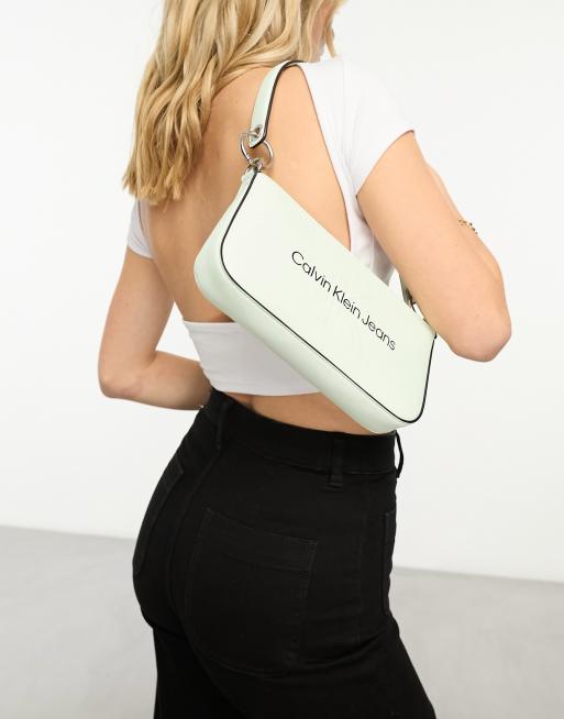 Calvin Klein Jeans sculpted shoulder pouch bag in white ASOS