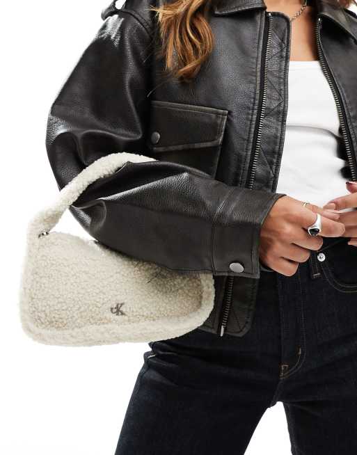 Calvin Klein Jeans sherpa mini zip bag in birch | ASOS