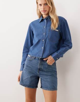 Calvin Klein Jeans - Short en jean évasé à taille haute - Bleu moyen délavé