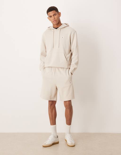 Calvin Klein Jeans – Shorts aus Frottee in Cremeweiß mit Aufnäher, 3 von 5