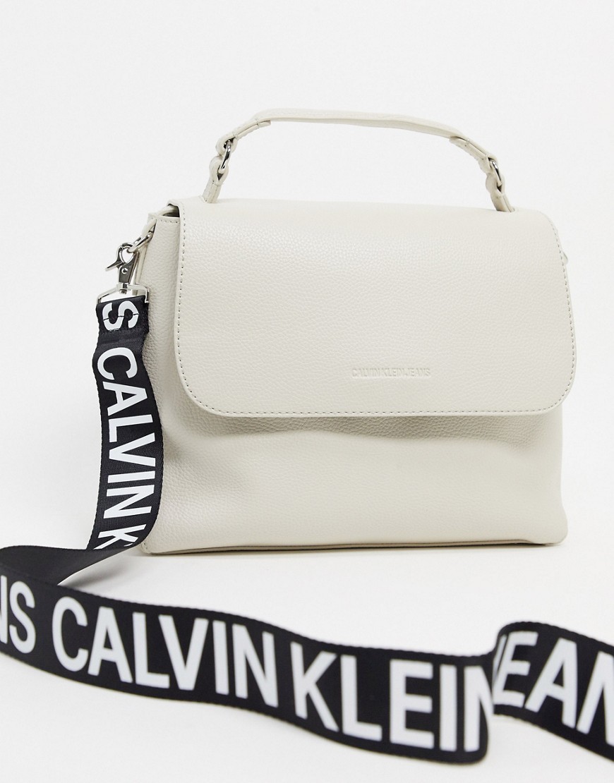Calvin Klein Jeans shoulder bag with logo strap in stone