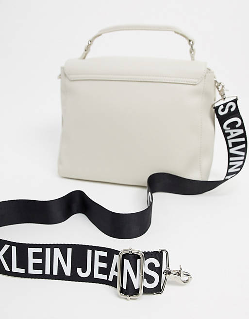 Calvin Klein Jeans shoulder bag with logo strap in stone | ASOS