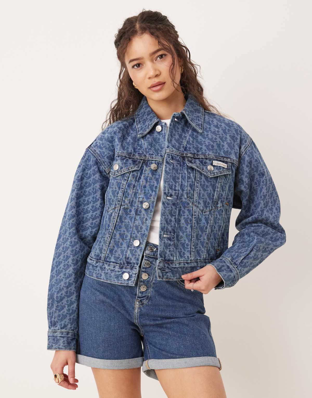 Calvin Klein Jeans signature 90s all over print denim jacket in mid blue