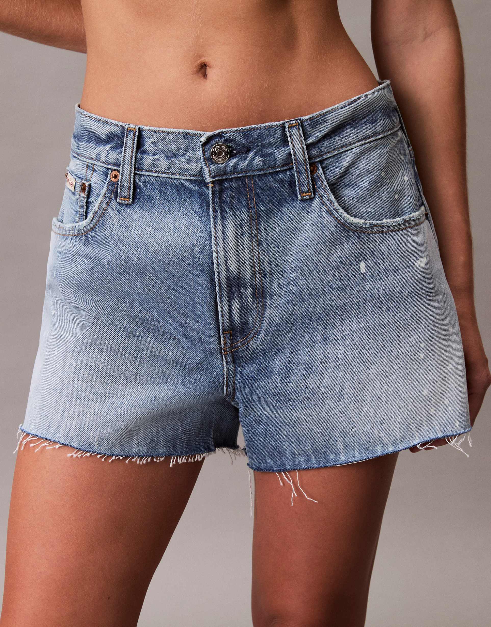 calvin klein jeans signature 90s splatter print denim shorts in light blue