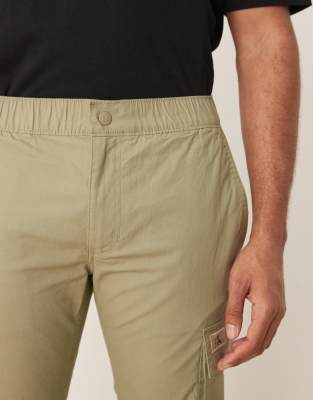 Calvin Klein Jeans skinny washed cargo pants in beige | ASOS