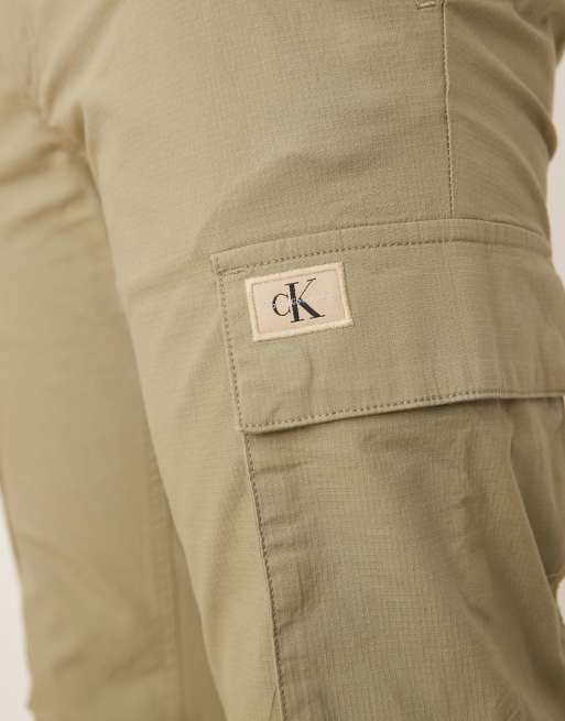パンツ [MATINKIM]washed cotton cargo pants in beige WASHED COTTON CARGO PANTS IN BEIGE - MATINKIM