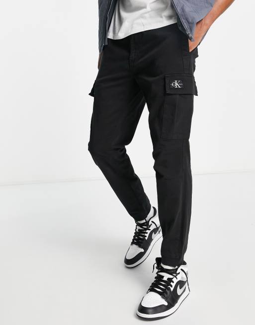 Calvin Klein Jeans skinny washed cargos in black | ASOS