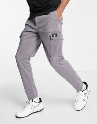 Calvin Klein Jeans Jogging Cargo Homme Ref 56130 P06 Gris Gris - Vêtements  Jeans Homme 64,94 €