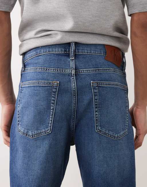 Calvin Klein Jeans slim denim shorts in mid wash blue, 5 of 5
