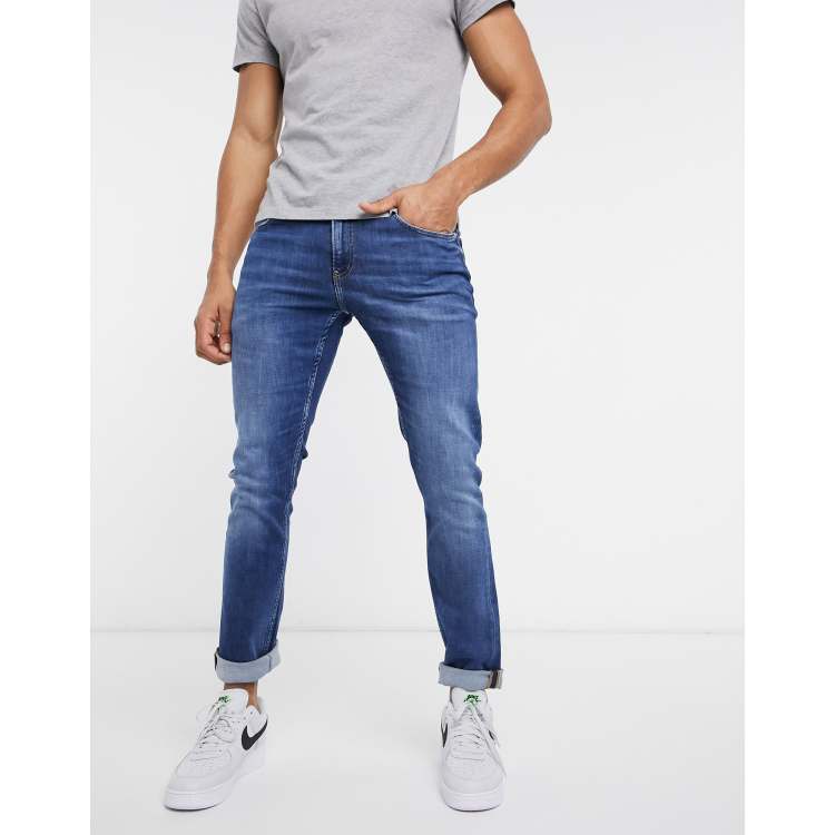 zuur doorboren medaillewinnaar Calvin Klein Jeans slim fit jeans in mid wash | ASOS