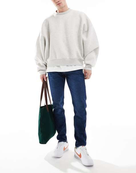 Calvin Klein Jeans - Slim jeans met smaltoelopende pijpen in donkere wassing - view 1