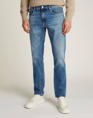 slim straight leg jeans in mid wash-Blue