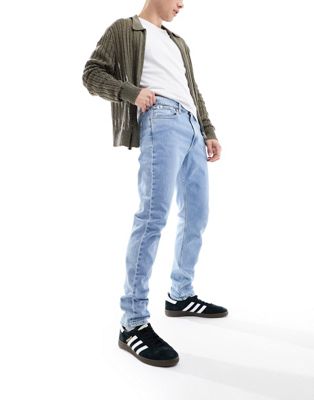 Calvin Klein Jeans slim taper jeans in light wash - ASOS Price Checker