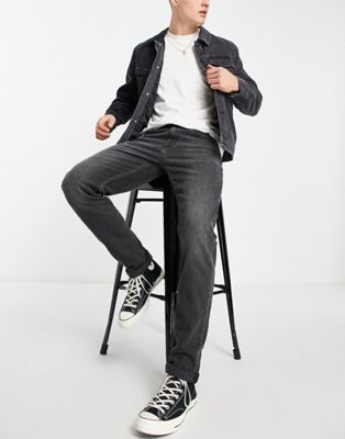 Calvin Klein Jeans slim tapered fit jeans in black wash