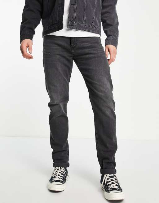 Calvin Klein Jeans slim tapered fit jeans in black wash