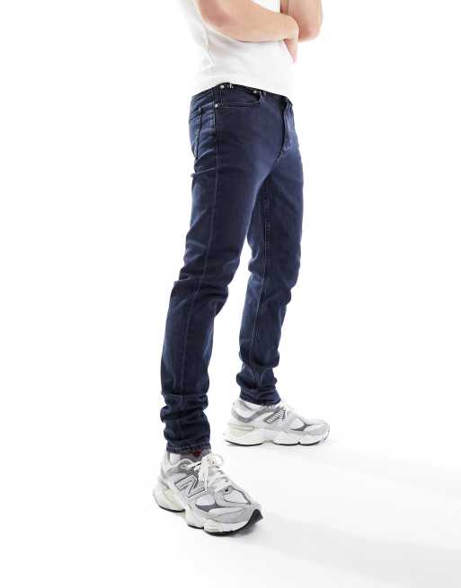 Calvin Klein Jeans SLIM TAPER - Slim fit jeans - dark blue/dark-blue denim  