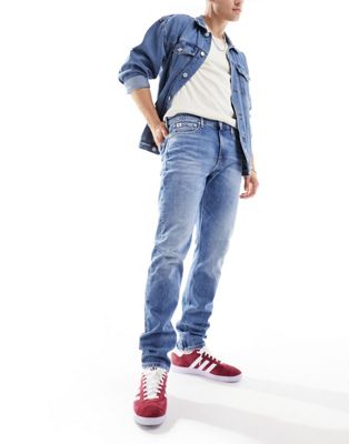 Calvin Klein Jeans slim tapered jeans in light wash - ASOS Price Checker