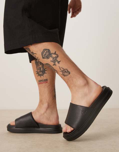 Calvin Klein Jeans - Slipper sandalen met reliëf in zwart - view 1