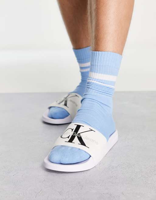Calvin Klein Jeans - Slippers met monogram in wit