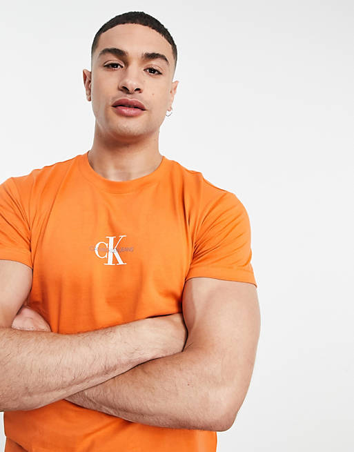 Calvin Klein Jeans small chest monogram t-shirt in orange | ASOS