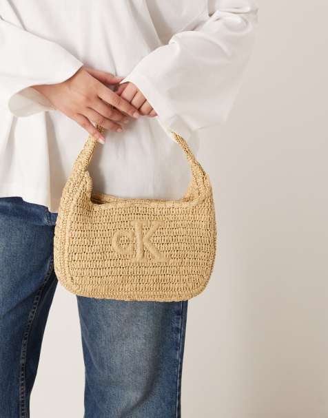 Calvin Klein Jeans small logo raffia shoulder bag in natural - view 1