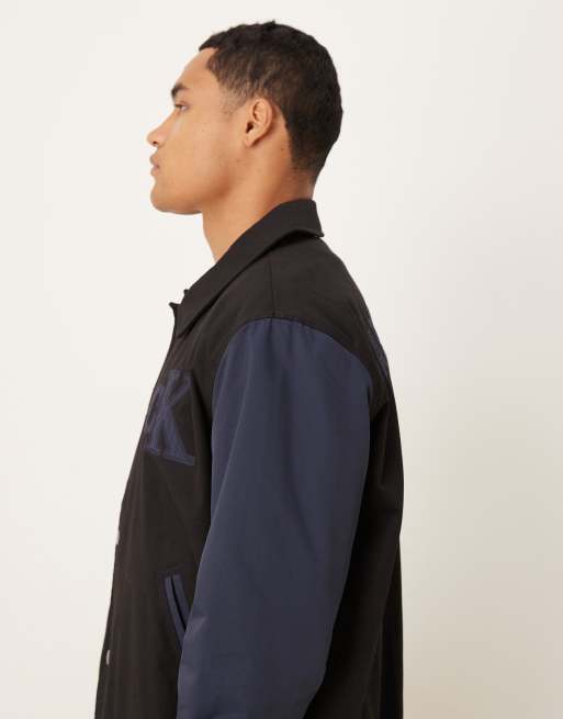 Calvin Klein Jeans - Sort og blå bomber-jakke i bomuld i college-stil, 4 af 5