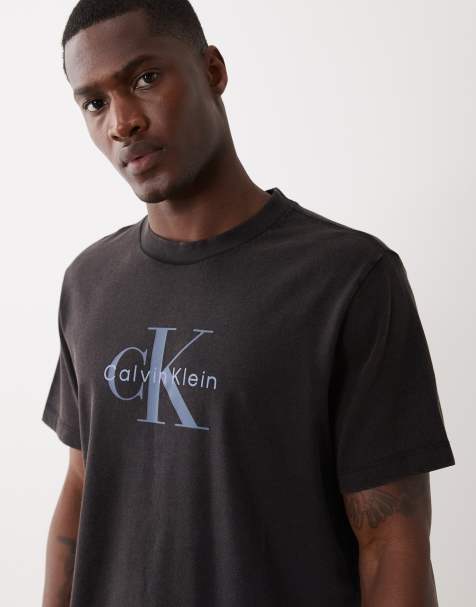 Calvin Klein Jeans - Sort T-shirt i syrevask med grafisk monogramlogo - view 1