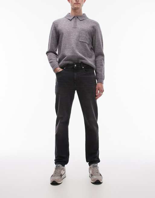 Calvin Klein Jeans - Sorte forvaskede jeans i tapered slim fit