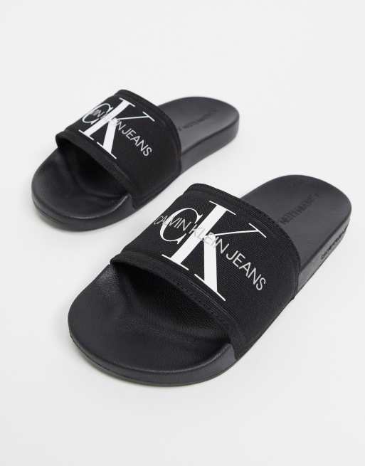 Calvin Klein Jeans - Sorte sliders i kanvas