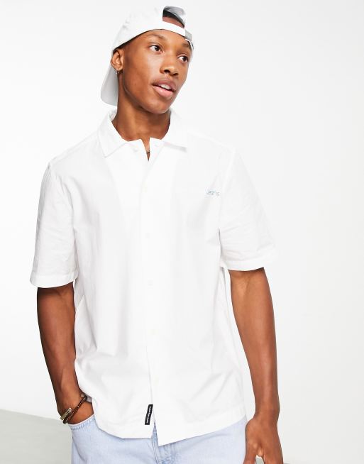 Calvin Klein Jeans splash photo back print short sleeve shirt in white |  ASOS