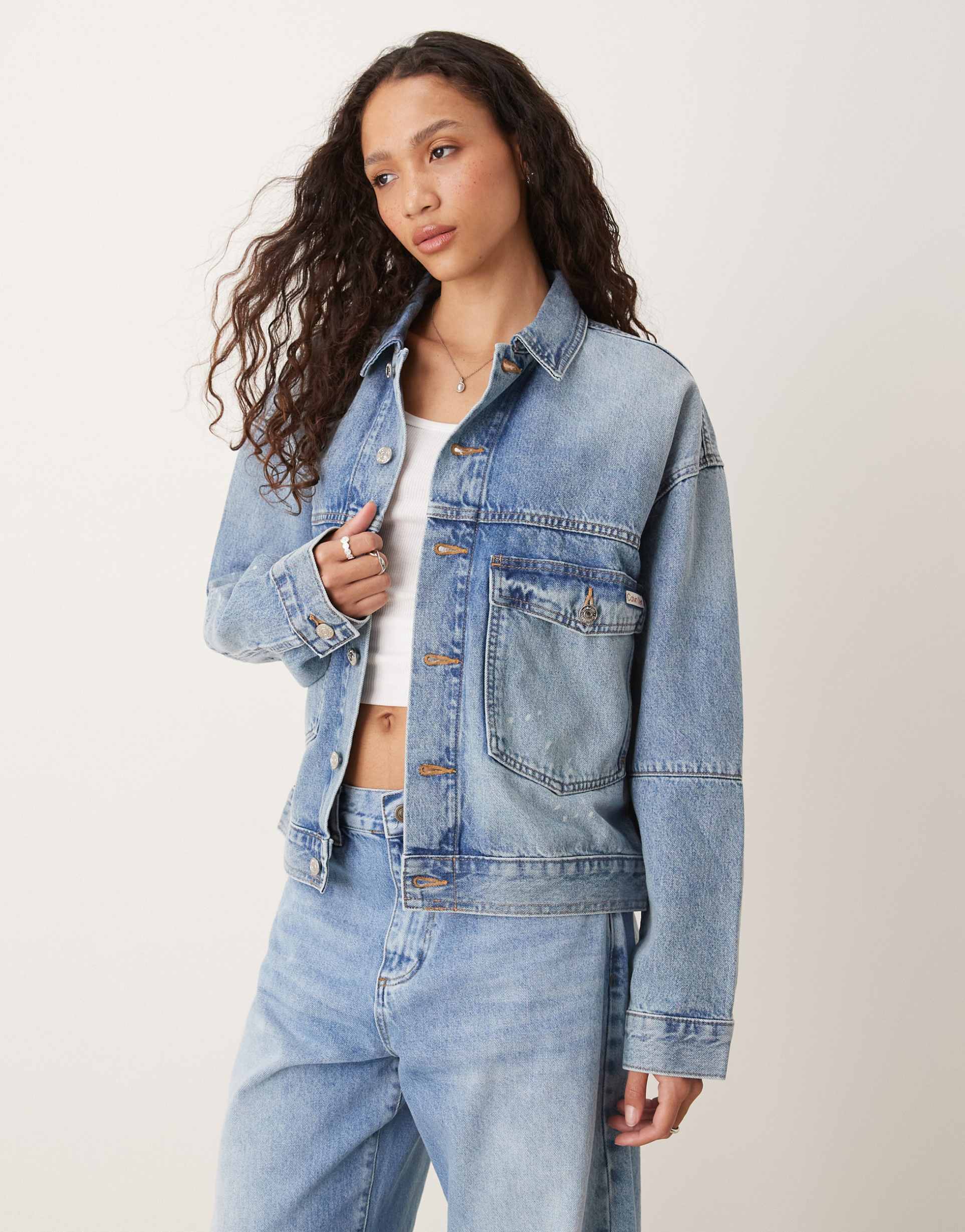 calvin klein jeans splatter print denim jacket in light blue wash